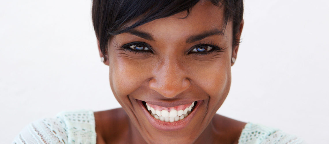 44418918 - close up portrait of an attractive african american woman smiling